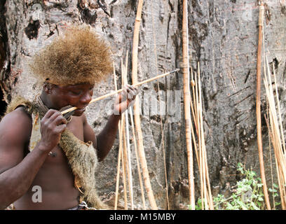 Hadza (or Hadzabe) Hunting party going to on a hunt. Photographed at Lake Eyasi, Tanzania Stock Photo