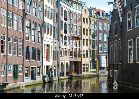 Amsterdam, Netherlands - April 20, 2017: Traditional old buildings in Amsterdam in spring, the Netherlands Stock Photo