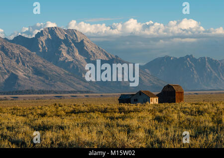 One of the Mormon Row barns with the Teton Mountains in the background.  Moose, Wyoming USA Stock Photo