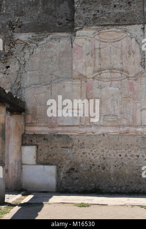 Paintings on walls of ancient ruins, Pompeii, Campania, Italy. Stock Photo