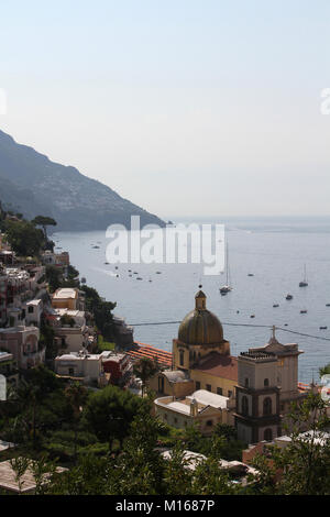 Southeast view of Positano village with the Church of Santa Maria Assunta, Amalfi Coast, Campania, Italy. Stock Photo