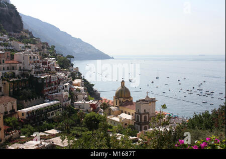Southeast view of Positano village with the Church of Santa Maria Assunta, Amalfi Coast, Campania, Italy. Stock Photo