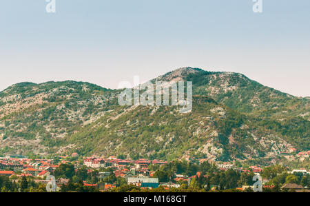 A small village and buildings in the green Balkan mountains of Montenegro. Stock Photo