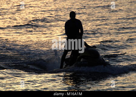 Jet skiing at Largs, on the Firth of Clyde. Stock Photo