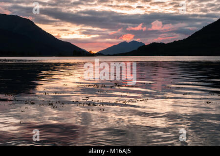 Late September sunset from the beach at Invercoe, near Glencoe, Scotland, looking out across Loch Leven and Loch Linnhe towards Ardgour and Ballachuli Stock Photo