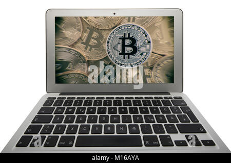 Symbol image turbulence, volatility, stock price digital currency, gold physical coin bitcoin laptop Stock Photo