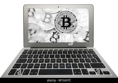 Symbol image turbulence, volatility, stock price digital currency, gold physical coin bitcoin laptop Stock Photo