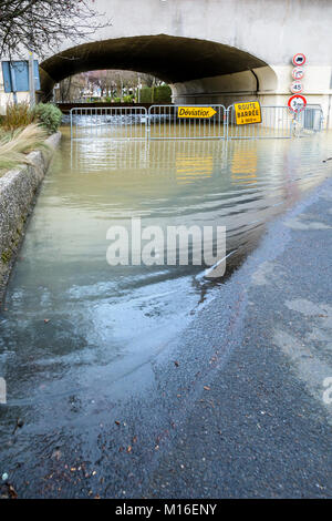 Bry-sur-Marne, Val-de-Marne, France - January 24, 2018: Yellow road signs installed on temporary gates show a traffic diversion in front of a tunnel f Stock Photo