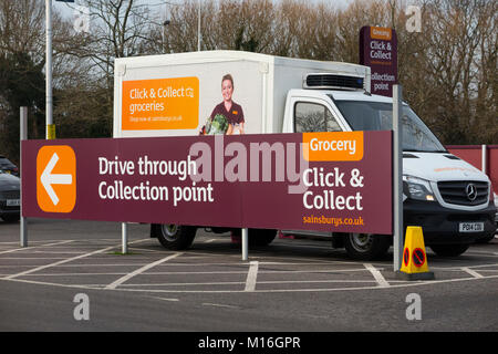 Sainsburys click and collect drive through collection point for groceries / collection grocery shopping, with Sainsbury delivery van. UK. (94) Stock Photo