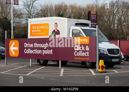 Sainsburys click and collect drive through collection point for groceries / collection grocery shopping, with Sainsbury delivery van. UK. (94) Stock Photo