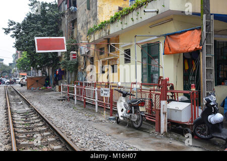 Hanoi, Vietnam - 14th December 2017. A residential street often referred to as Train Street in central Hanoi which has grown up around a trainline Stock Photo
