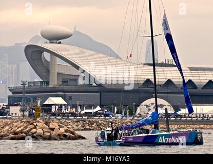 Victoria Harbour, Hong Kong. 27th January 2018. AkzoNobel Volvo Ocean Race Yacht Team return to dock at Kai Tak Runway Park after winning the HGC In-Port Race in Victoria Harbour Hong Kong. Jeremy Goodson/Alamy News Stock Photo