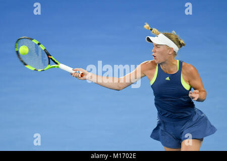 Melbourne, Australia. 27th Jan, 2018. Number two seed Caroline Wozniacki of Denmark in action in the Women's Final against number one seed Simona Halep of Romania on day thirteen of the 2018 Australian Open Grand Slam tennis tournament in Melbourne, Australia. Sydney Low/Cal Sport Media/Alamy Live News Stock Photo