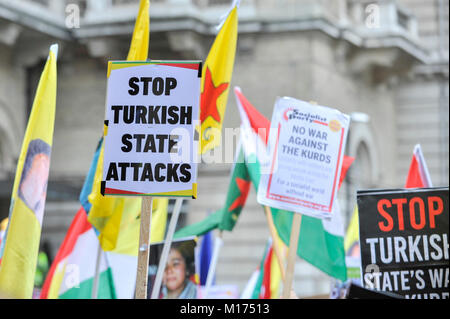 London, UK.  27 January 2018.  Signs held aloft as thousands of Kurdish people gather outside the BBC's Headquarters in Portland Place to march to Downing Street to protest against Turkey's military invasion of the city of Afrin in Northern Syria, a predominantly Kurdish city.  Protesters called for the British public to show solidarity with the people of Afrin and for the UK to demand that Turkey pull back its forces. Credit: Stephen Chung / Alamy Live News Stock Photo