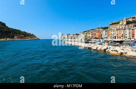 Beautiful medieval fisherman town of Portovenere bay (near Cinque Terre, Liguria, Italy). Harbor wit boats and yachts. People unrecognizable. Stock Photo