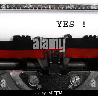 Text YES written with the typewriter on white sheet Stock Photo