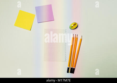 stickers, sharpener,record sheets and pencils. Office theme with a gradient. Stock Photo