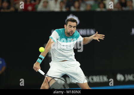 Melbourne, Australia. 28th January 2018. Bosniac tennis player Marin Cilic is in action during his finals match at the Australian Open vs Swiss tennis player Roger Federer on Jan 28, 2018 in Melbourne, Australia.- ©Yan Lerval/Alamy Live News