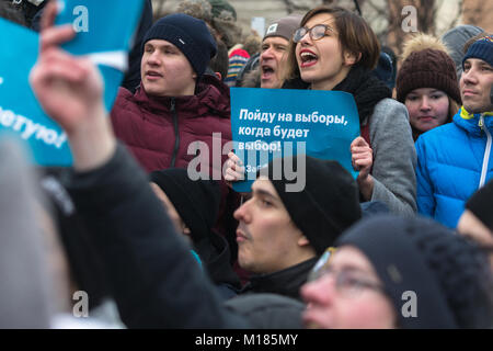 Moscow, Russia. 28th January, 2018. Young protesters hold a banners during a rally in Moscow, Russia. Opposition politician Alexey Navalny calls for nationwide protests following Russia's Central Election Commission's decision to ban his presidential candidacy. Credit: Victor Vytolskiy/Alamy Live News Stock Photo