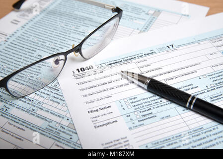 USA tax form 1040 with eyeglasses and Pen Stock Photo