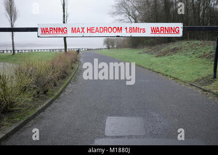 Warning max headroom sign over road for safety of high vehicles Stock Photo