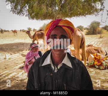 Jaisalmer, India - Mar 4, 2012. A man with mustache on Thar Desert in Jaisalmer, India. Jaisalmer, the Golden City, is located on the westernmost fron Stock Photo