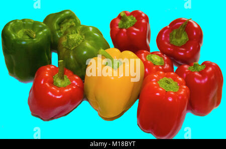 red and yellow and green sweet peppers in blue background Stock Photo