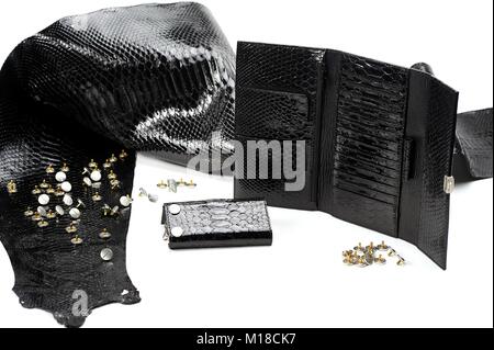 Black smooth pieces of leather look like reptile skin Stock Photo