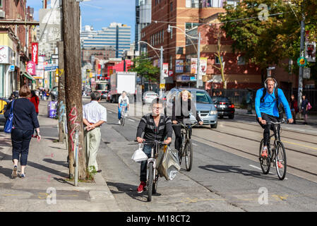 Commuter cyclists in downtown Toronto, Ontario, Canada.