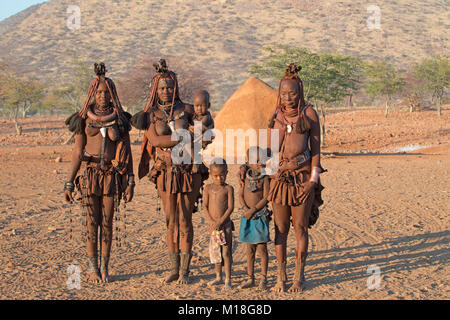 Himba women and children,Kaokoveld,Kunene,Namibia Stock Photo