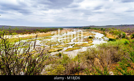 The almost dry Olifant River in Kruger National Park in South Africa at the end of the dry season viewed from Olifant Camp Stock Photo