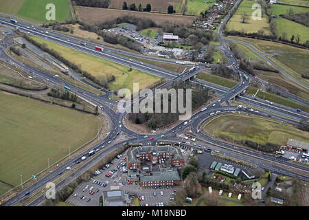 A roundabout above a motorway Stock Photo - Alamy