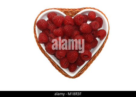 raspberries in the bowl in the form of heart Stock Photo