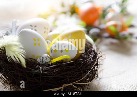 Easter eggs decoration, eggs in the nest, springtime rural composition Stock Photo