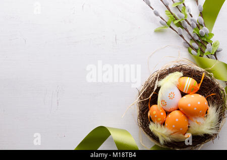 Happy easter decoration background, eggs in the nest, springtime rural composition top view concept Stock Photo