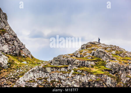 Man on top of the hill in Bergen, Norway Stock Photo