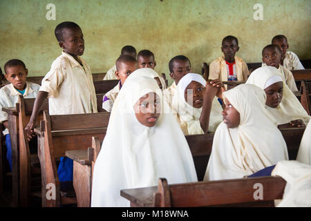 KENDWA, ZANZIBAR - JAN 10, 2018: Students in a classroom during English lesson, Primary school at Kendwa, Zanzibar Stock Photo