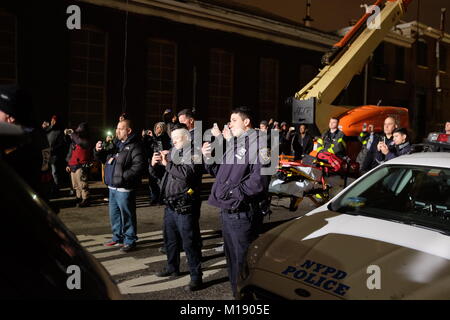 New York City, United States. 27th Jan, 2018. Filming continued with a bang on Martin Scorsese's 66th motion picture as director, 'The Irishman,' as pyrotechnic shots were completed in Brooklyn's Gowanus neighborhood. The film stars Robert De Niro, Joe Pesci and Al Pacino, and which depicts an aging hitman's recollection of assassinating Teamster's boss Jimmy Hoffa. Credit: Andy Katz/Pacific Press/Alamy Live News Stock Photo