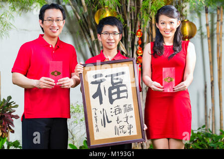 Family celebrating Chinese new year Stock Photo