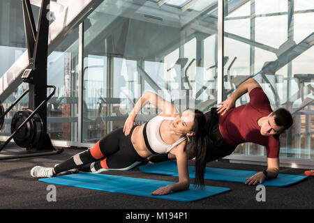 Sports Couple Working out in Gym Stock Photo