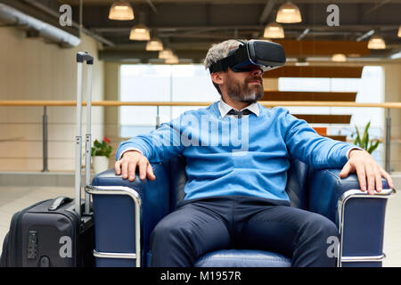 Mature Man Using VR Stock Photo