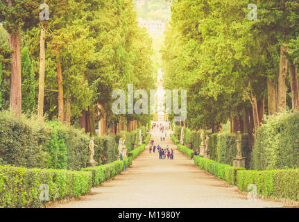 green alley in Boboli gardens at summer day, Florence, Italy, retro toned Stock Photo