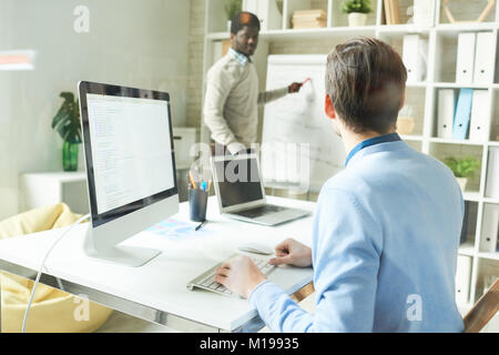 Web Developers Team Working in Office Stock Photo