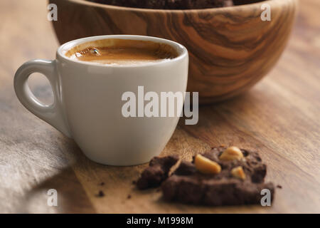 fresh espresso with homemade cookie with hazelnuts Stock Photo