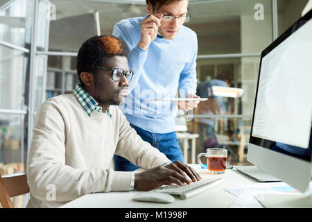 Web Developers Working on Code Stock Photo