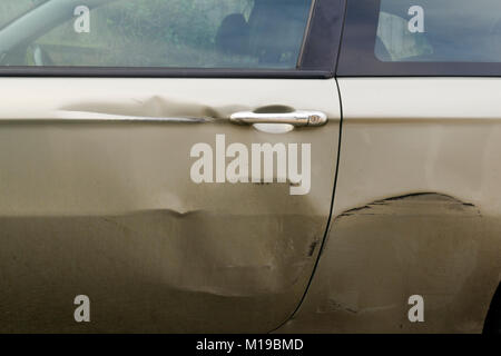 Dents in the side of car Stock Photo