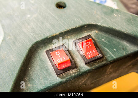 Close-up of two small switches on and off Stock Photo