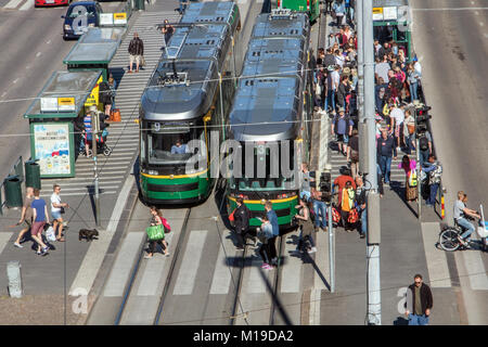 FINLAND, HELSINKI, JUL 02 2017, trams are standing on the main street beside main railway station at Helsinki (Helsingin Rautatieasema), Finland. Stock Photo