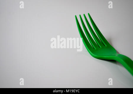 Plastic forks isolated on white background Stock Photo