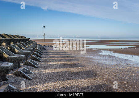 New Brighton beach wave breakers and sea defence system Stock Photo